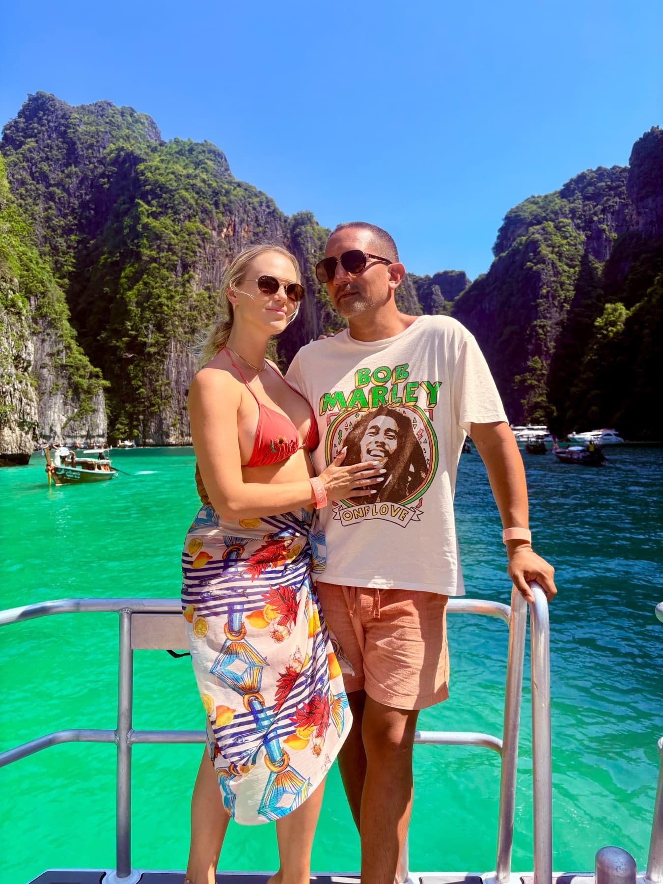 David and Daria on the water on a tropical getaway